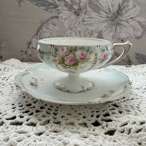Elegant Floral Teacup and Saucer Set